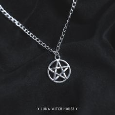 The traditional pentagram star - it's what any witch would want on a necklace! This is a beautiful gothic fashion statement! - Material Type: Zinc Alloy - Chain Length: 18 inches - Pendant Size: 2cm All necklaces are inside a material pouch and then carefully placed inside an envelope lined with bubble wrap to ensure no damage in transit. *Please note that although item photography is as accurate as possible, some screens may portray the item colour slightly different to the colour in person. By browsing this shop or placing an order, you agree not to copy, resell or duplicate the product. This includes all illustrations as well as the representation of products. All work is intellectual property of Luna Witch House which will lead to infringement if exploited or violated. This work is sub Gothic Silver Jewelry With Star Charm, Witch Necklace Pendants, Item Photography, Witch Accessories, Gothic Mode, Gothic Jewellery, Pentagram Necklace, Witch Necklace, Pentagram Pendant