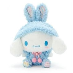 a blue stuffed animal with ears and eyes