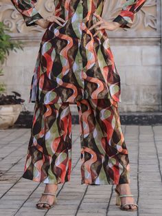 Introducing the stunning "alluring multi-color printed cotton event wear top palazzo co-ord set" from Ethnic Plus! This beautiful set includes a multi-color cotton material top with intricate digital printed work, paired with a matching palazzo featuring the same digital print. Fully stitched and available in sizes S to XXL, this co-ord set is perfect for festivals and events where you want to make a style statement.
This set includes its vibrant multi-color design, high-quality cotton material, Multicolor Digital Print Sharara For Festivals, Festival Multicolor Sharara With Digital Print, Eid Multicolor Block Print Salwar Kameez, Festival Multicolor Digital Print Sharara, Festive Multicolor Digital Print Sharara, Multicolor Digital Print Sharara For Diwali, Straight Kurta Sets With Digital Print For Festivals, Multicolor Block Print Palazzo Set For Festivals, Multicolor Block Print Salwar Kameez For Navratri