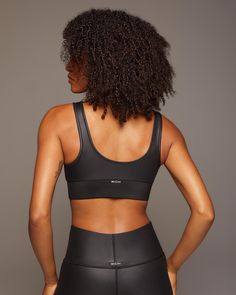 Ships from Canada, please allow an extra 7-14 business days for delivery. Designer’s Notes A streamlined, classic scoop silhouette, created in sustainable Liquid Gloss fabric, with a supportive elastic chest band and removable bra cups. Features Sweat-wicking Eight-way stretch For performance or everyday wear 2.5" soft and supportive elastic chest band Removable bra cups provide shape and coverage Made with Love in Canada Size & Fit Slim - Streamlined to hug the body High support Model measureme Designer Activewear, Facebook Features, Longline Bra, Activewear Brands, Performance Leggings, Body Sculpting, Sporty Chic, Bra Cups, Bra Women