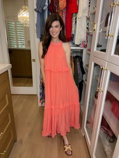 Get ready to dream of summer in our Summer Dream Maxi Dress! Made with lightweight, airy fabric, this gorgeous coral dress has that effortless feel and features a tiered body with ruffle trim. Add a slicked back ponytail or bun and pair with sandals or wedges for the perfect summer look. Carefree, chic, and easy - it's the perfect summer dress! This if fully lined. Strap length can be adjusted in the back. Dress measures 53" in length. Bust measures 22" from underarm seam to seam. Measurements t Back Ponytail, Slicked Back Ponytail, Twirly Skirt, Deodorant Stains, Coral Dress, Summer Dream, Scarf Hat, Back Dress, Summer Look