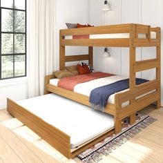 a wooden bunk bed sitting next to a window in a room with hardwood flooring