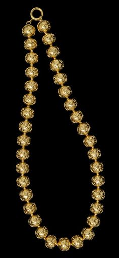 "Contas de Viana". Traditional hollow gold beaded necklace with filigree work on the beads. Girls bought them bead by bead, as they had money, in order to form the necklace. In older times, their necklaces went only halfway down the neck and was connected through colored yarn with a colored pompom finish. Monogram Machine, Accessories Style, Gold Bead Necklace, We Are The World, Gold Ornaments, Neck Jewellery, Fancy Jewelry, Gold Beads