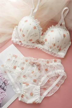 Indulge in the playful charm of the Sweet Delights Cotton Bra Set from StylinArts. This adorable lingerie set features a fun and whimsical pattern, available in strawberry, radish, and peach prints, perfect for adding a touch of sweetness to your everyday wear. The bra is designed with a soft steel ring for upper support, ensuring both comfort and style. Complemented by a matching pair of panties, this set is crafted from high-quality cotton, providing a soft and breathable feel. The bow detail Bra Panty Set, Coquette Bra, Bow Bra, Coquette Dress, Cotton Bra, Panty Style, Cute Bras, Cotton Bras, Cute Strawberry