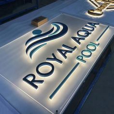 the royal room sign is lit up with leds on it's front wall