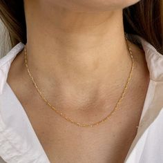 The Fiona Essential Chain has a beautiful pattern that feels dainty and feminine. A pattern of varying lengths of links, creates soft shimmer. Lightweight and perfect for everyday wear. Add one of our Bijou gemstone or pearl charms to effortlessly elevate the Fiona Chain. - 16-18 inches & super versatile. 18 inches is a true classic length or wear it closer to 16 inches for a shorter style, sitting closer to the base of the neck. - all pieces are 14K Gold filled or Sterling Silver (For more info Minimalist Chain Link Necklace For Gift, Chic Jewelry With Delicate Chain And Link Shape, Elegant Jewelry With Delicate Oval Link Chain, Elegant Jewelry With Delicate Link Chain, Dainty Everyday Necklace With Chain, Classic Necklace With Delicate Chain Links, Long Figaro Chain Necklace As Gift, Chic Figaro Chain Jewelry With Oval Link, Everyday Charm Necklaces With Cable Chain