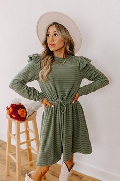 - Step out in charm with this darling mini dress! Featuring ruffled shoulders and a cinched waistline, it's perfect for effortless everyday elegance. - Unlined, ultra-soft material with a brown, blue, and green hued striped pattern - A crew cut neckline - Long sleeves with ruffled shoulder details - A functional drawstring to cinch the waist - Hidden side pockets - A relaxed yet flattering silhouette that ends in a straight mini dress length hemline Casual Ruffle Sleeve Mini Dress For Fall, Casual Mini Dress With Ruffle Sleeves For Fall, Fall Khaki Mini Dress, Green Ruffled Mini Dress For Fall, Fall Mini Dress With Ruffle Sleeves, September Fashion, Concert Fashion, Everyday Elegance, Crew Cut