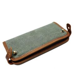 The Woosir Vintage Canvas Wallet is a stylish and functional wallet designed for everyday use. It is made from a waterproof canvas material and features a spacious main compartment, multiple card slots, a large coin pocket and a secure zip closure. This wallet is perfect for carrying cards, cash, coins and other personal items. The wallet also comes with a detachable wrist strap for convenience and a secure zip closure for added security.  
 ITEM DETAILS:  
  
 Item Size: 20cm x 10cm x 2cm  
 It Practical Travel Wallet Rectangular, Practical Travel Wallet, Practical Rectangular Travel Wallet, Travel Bifold Card Holder With Pockets, Multifunctional Travel Wallets With Interior Card Slots, Casual Travel Wallet Rectangular, Multifunctional Travel Wallet With Interior Card Slots, Casual Rectangular Travel Wallet, Rectangular Wallets With Pockets For Everyday Use