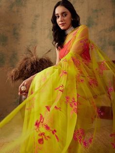 Yellow net sareeHas floral sequin embroidered detailThe saree comes with an unstitched blouse piece The blouse worn by the model might be for modelling purpose only. Check the image of the blouse piece to understand how the actual blouse piece looks like. Wedding Sarees Online, Indian Wedding Saree, Diwali Sale, Wedding Saree Indian, Blouse Sale, Net Saree, Wedding Sarees, Rich Fabric, Wedding Saree