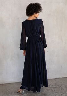 Memory Lane Maxi Dress $98.00$49.00 Elegant V-neck Dress With Smocked Bodice, Chiffon Maxi Dress With Ruched Bodice And V-neck, Chiffon Maxi Dress With Smocked Back, Elegant Long Sleeve Maxi Dress With Smocked Back, Chiffon Maxi Dress With Ruched V-neck, Ruched Chiffon Maxi Dress With V-neck, V-neck Maxi Dress With Smocked Back For Date Night, Elegant Maxi Dress With Ruched Bodice, Evening Maxi Dress With Ruched Bodice And Surplice Neckline