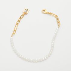 Delicate fresh water pearls and a pretty, rope-textured chain are a timeless combination. Perfect for stacking and adding charms--either one between the pearls, or several along the chain. Materials: 6.75-7.75" Overall Gold-Plated Brass Lobster Clasp Closure Genuine fresh water pearls Classic White Chain Bracelet With Pearl Drop, Delicate Baroque Pearl Bracelet With Pearl Chain, Delicate Baroque Pearl Chain Bracelet, Delicate Baroque Pearl Bracelet, Elegant Charm Bracelet With Pearl And Round Beads, Classic White Pearl Chain Bracelet, White Pearl Bracelet With Adjustable Chain, Elegant Pearl Bracelet With Chain Detail, Elegant Beaded Pearl Bracelet