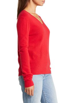 Stay warm in this luxuriously soft cashmere sweater fashioned in a relaxed, easy-to-layer fit. V-neck Long sleeves 100% cashmere Dry clean Imported Classic Red V-neck Sweater For Fall, Red Cashmere Sweater With Fine Knit, Casual Red Cashmere Tops, Casual Cashmere V-neck Sweater For Layering, Red Cashmere Winter Top, Casual Cashmere V-neck Sweater For Winter, Red Cashmere Sweater For Fall, Cashmere V-neck Sweater, Casual V-neck Cashmere Sweater