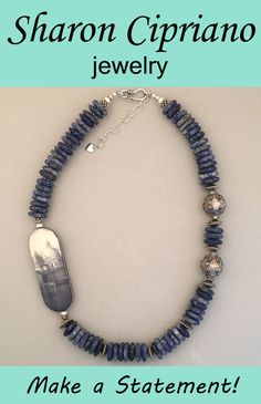 One-of-a-kind sodalite and silver statement necklace featuring handcrafted art bead. Bohemian Hand-strung Lapis Lazuli Jewelry, Artisan Necklaces With Large Beads For Healing, Healing Beaded Rondelle Jewelry, Silver Agate Jewelry With Large Beads, Handmade Kyanite Healing Necklaces, Handmade Bohemian Kyanite Jewelry, Handmade Artisan Rondelle Beads, Oval Beaded Jewelry As A Gift, Handmade Rondelle Artisan Beads