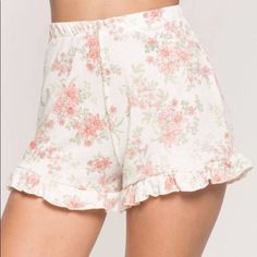 Amazingly Cute For Spring Or Summer. These White Floral Shorts Are Ribbed Featuring An All Over Ruffle Trim And Elasticize Waist. Partially Lined With Finished Seams. 100% Cotton. Cold Wash, Tumble Dry. Model Is 5’8” In Size Small. Bin New#1t Posh Ambassador | Top Rated Seller | Next Day Shipping | Offers Welcome | Bundle & Save White Floral Print Pajama Shorts For Loungewear, Feminine Spring Bottoms For Pajama Party, Spring Stretch Shorts For Sleepover, Stretch Shorts For Sleepovers In Spring, Stretch Shorts For Sleepover In Spring, Feminine Floral Print Bottoms For Loungewear, Feminine Floral Print Loungewear Bottoms, Feminine Spring Bottoms For Sleepover, White Spring Sleepwear With Elastic Waistband