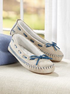 These fun mocs add a pop of color in an enduring style that's a favorite for its casual looks and easy fit. The soft suede upper is saturated in color and crafted with working "skip laces" and topstitch detailing. The inside is lined with quilted brushed terry that surrounds the deep memory foam footbed. Slip-on moccasin-style slippers Soft suede upper Lined with quilted brushed terry Deep memory foam footbed Working skip lacing adjusts for the most comfortable fit EVA rubber outsole Upper, sued Luxury Designer Plain Toe Moccasins, Luxury Formal Moccasins With Contrast Sole, Elegant Luxury Moccasins With Textured Sole, Luxury Casual Slip-on Moccasins, Timeless Luxury Moccasins For Semi-formal Occasions, Luxury Chic Round Toe Moccasins, Luxury Formal Slip-on Moccasins, Luxury Modern Moccasins With Flat Heel, Luxury Low-top Formal Moccasins