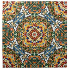 an intricately designed tile with many colors