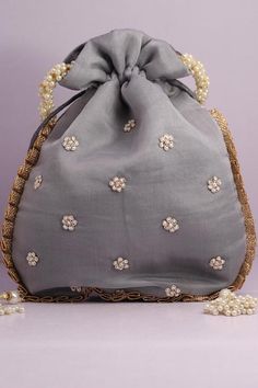 Material:Silk, Golden Tread, Golden Sequins, MotifsColor: Aqua, Grey, Pink, PeachPackage Contents: As per quantity purchasedSize: 10" x 8"Designed with the heart, this beautiful Potli or batawa bag are eye catchy and made of premium material.Key Features:Embroidery art workThis potli is good match with both Indian and western outfits and are superb for wedding and festive parties.This would be best complement to your designer saree, lenhga or any other kind of dress.This is the combination of tr Potli Bag, Free Crochet Bag, Diy Bag Designs, Step By Step Crochet, Potli Bags, Beginner Crochet Projects, Beige Bag, Embroidery Bags, Handcrafted Bags