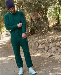 Inspired by vintage athleticwear, The Stadium Sweatpant. is a men’s classic. Made of softly washed cotton, it features an elasticated waist with hidden drawstring, elastic leg cuffs, pockets on the side seam, and a patch pocket in back. Our knits are crafted here in Los Angeles, ensuring authenticity and uniqueness - making no two pieces alike. 100% Cotton Machine Wash Cold, Tumble Dry Low Made in the U.S.A. Emily And Meritt, College Sweatshirt, Leg Cuffs, Vintage Sweatshirt, Two Pieces, Patch Pocket, Over The Years, The Man, Fitness Models