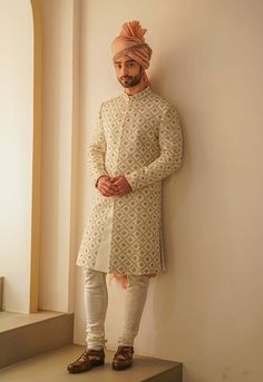 Editor's Note Ivory Sherwani With Jaal Hand Embroidery, Paired With Old Rose Ombre Stole, Ivory Kurta And Churidar Fabric: Linen Silk Color: Ivory Component: Sherwani, Kurta, Churidar, Stole, Safa Care: Dry Clean Only About the Designer After establishing himself as the leading couturier in the industry of menswear, Jatin Malik went on to explore luxury footwear. You can order online these amazingly designed handmade shoes that are being offered in classy Caligae and Peshawari patterns! We recog Manpreet Toor, Ivory Sherwani, Jatin Malik, Jaal Embroidery, Dhoti Pants, Luxury Footwear, Royal Look, Haldi Ceremony, Indian Man