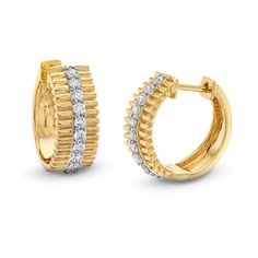 These Three Row Texture Diamond Huggie Earrings feature a single row of approximately 0.36 brilliant cut diamonds in the middle of two rows of 14K yellow gold. Diamond Pave Setting Huggie Earrings In Yellow Gold, Yellow Gold Huggie Diamond Earrings With Pave Setting, Luxury Diamond Earrings Channel Set, Elegant Yellow Gold Diamond Earrings With Baguette Diamonds, Timeless Yellow Gold Huggie Earrings Brilliant Cut, Elegant Diamond Earrings With Channel Set, Timeless Yellow Gold Earrings With Baguette Diamonds, Formal Yellow Gold Huggie Earrings With Pave Setting, Timeless Yellow Gold Diamond Huggie Earrings