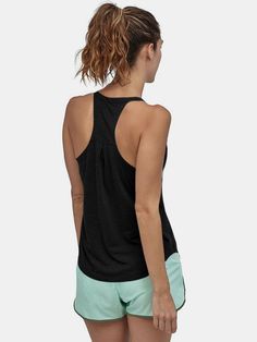 Get ready to get active with our Scoop Neck Active Tank! Perfect for summer workouts, this tank will keep you cool and comfortable while you break a sweat. With a stylish scoop neck design, you'll be ready to hit the gym or the park in style. Sheer: Opaque Stretch: Moderate stretch Material composition: 65% cotton, 35% polyester Care instructions: Machine wash cold. Tumble dry low. Imported Athleisure Tops With Scoop Back For Gym, Stretch Scoop Back Activewear For Summer, Summer Activewear With Stretch And Scoop Back, Sporty Summer Yoga Tops, Summer Scoop Back Sporty Activewear, Summer Yoga Top With Scoop Back, Scoop Neck Stretch Activewear For Workout, Scoop Back Tops For Yoga In Summer, Athleisure Yoga Tops With Scoop Back