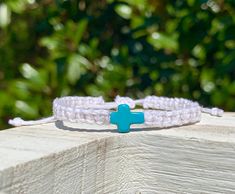 "Handmade stone cross Christian friendship bracelet.  This bracelet is made from 100% Organic and Biodegradable Hemp Cord, and can easily be adjusted by the sliding knot! Sizing-  Small: 5-9\" Medium: 6-11\" Please Note:  *Multicolor cord patterns may vary  *Cord thickness may slightly vary with different colors  *Cross charm colors may vary Multiple items are not packaged separately unless specified by buyer in the \"Note to sellers\" box at checkout, or via messages.  Buy A Bracelet, Plant A Seed. 🌱  Each purchase you make from my shop helps spread the Good News of Jesus Christ to more people in my local area!  Have any questions? Feel free to ask!  We're happy to help! : )  *We are not responsible for any delays caused by the USPS.*" Hypoallergenic White Braided Bracelets As Gift, White Hypoallergenic Spiritual Friendship Bracelets, Adjustable Cross Friendship Bracelets As Gifts, Spiritual Adjustable Cross Beaded Bracelets, Adjustable Hypoallergenic Cross Rosary Bracelet, Adjustable Spiritual Cross Beaded Bracelets, Handmade Adjustable Cross Bracelets, White Adjustable Cross Rosary Bracelet, Adjustable White Rosary Bracelet With Cross