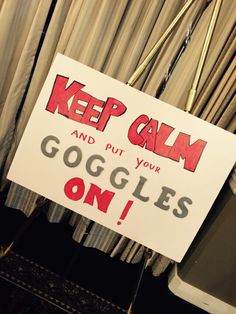 a sign that says keep calm and put your googles on