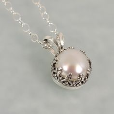 Edwardian Vintage-Inspired Pearl Pendant Necklace in Sterling Silver Luxury Classic Sterling Silver Pearl Necklace, Affordable Silver Jewelry With Pearl Pendant, Silver Necklace With Pearl, Elegant Pearl Necklace With Intricate Design, Elegant Silver Pearl Necklace With Intricate Design, Elegant Round Pearl Necklace With Intricate Design, Silver Pearl Necklace With Intricate Design, Timeless Silver Pearl Necklace For Wedding, Oval Pearl Pendant Jewelry In Pearl White