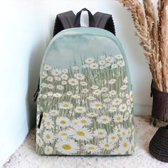 ✨Happy Holidays! Please note that items made and shipped from our China production facility will not arrive before Christmas. We recommend placing your order only if timing is not a concern. Thank you for your understanding!✨ Cottagecore wildflower daisy blue sky backpack, S M L sizes, back to school day pack, botanical nature lovers canvas school bag, boho gift Versatile Canvas Backpack with mushroom All-Over Print Crafted entirely from 100% polyester, this canvas backpack stands out with its v Spring Backpack With Floral Print For Everyday Use, Floral Print Backpack For Everyday Use In Spring, Spring Floral Print Backpack For Everyday Use, Spring Floral Print Standard Backpack, Floral Print Backpack For School In Spring, Spring Floral Print Backpack For Daily Use, Green Standard Backpack For Spring, Green Spring Standard Backpack, Cute Standard Backpack For Spring