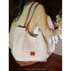 Natural beige colored woven tote bag. It has a distinctive soft texture and is accented with a brown leather strap. Items that will enhance your vacation mood. The atmosphere is casual and relaxed. 
 
 
 Size 
 
 
 FREE size 
 
 Height: 24cm 
 Width: 39cm 
 Depth: 9cm 
 
 
 
 
 
 Material 
 
 Polyester 
 Synthetic leather Casual Beige Woven Bucket Bag, Beige Crochet Satchel Bag With Woven Details, Casual Brown Hobo Bag With Braided Handles, Casual Beige Bucket Bag With Braided Handles, Chic Beige Crochet Satchel Bag, Casual Beige Beach Bag With Leather Handles, Casual Beige Crochet Tote Bag, Casual Cream Square Hobo Bag, Casual Beige Square Hobo Bag