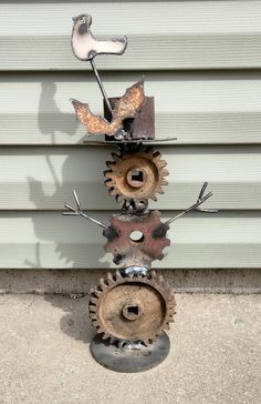 a metal sculpture made to look like gears