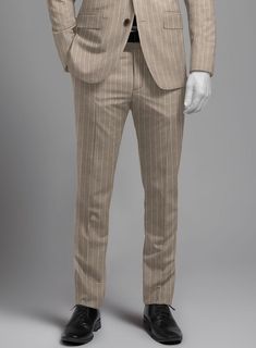 A refined style that allows you to move with ease and grace is embodied in our Napolean Genova Stripe Dark Beige Wool Suit, perfect for leaving lasting impressions at formal gatherings or corporate affairs. Custom-made from a wool blend, our suit features a stripe pattern woven into the fabric in a sophisticated beige color, adding subtle hints of understated luxury to your ensemble. Invest in this charming epitome of class and set new standards with modern fashion.  Look Includes    Napolean Genova Stripe Dark Beige Wool  Fabric  Two Button Jacket Style  Notch Lapel   Horn Brown  Buttons  Single Vent  Three Cuff Buttons  Two Welted Back Pockets on Trousers   Click 'Customize Now' to modify the look if needed.   Lining: Viscose, Dry Clean, Pants can be lightly washed. Blue Tweed Jacket, Tweed Shirt, Peaky Blinders Suit, Tan Suit, Beige Suits, Suit Shirts, Twill Shirt, Stretch Chinos, Dark Beige