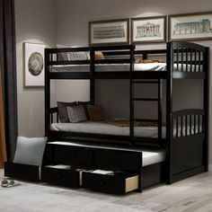 a bunk bed with drawers underneath it