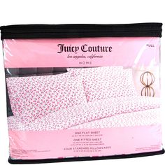 the pink and white bedding is packaged in a plastic bag with black trims