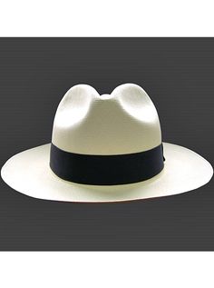 Brand: Gamboa PremiumColor: Natural Material: Toquilla Straw Brim: 7 - 8 cm. (2.76"- 3.16")Grade: 19 - 20 (Fine Fine)learn more Sweatband: Cotton Twill, 3 cm. (1.18") Crown: 10.37 - 10.87 cm. (4.1" - 4.3") Ribbon: Linen Description: A luxurious hat, handmade in Montecristi, the worldwide famous Panama Hat town in Ecuador. This Panama Fedora hat (Tuis) is a top quality, classic and elegant hat. Each hat is individually blocked and trimmed to meet the highest quality standards.Each Gamboa Premium White Brimmed Panama Hat For Formal Occasions, White Panama Hat With Curved Brim For Formal Occasions, White Flat Brim Fedora For Formal Occasions, White Curved Brim Panama Hat For Formal Occasions, Formal White Panama Hat With Curved Brim, Formal Fitted Panama Hat With Flat Brim, Formal Fitted Panama Hat With Curved Brim, White Formal Panama Hat, Classic Flat Brim Panama Hat For Formal Occasions