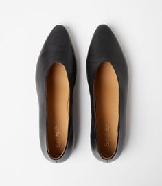 Slip into comfort and style with these versatile black leather ballet flats! Featuring a pointed toe design, these flats are perfect for any occasion. Dress them up or down, these flats are sure to be a staple in your wardrobe. True to size Material: Leather Heel height: 0.25" Imported Seychelles Wipe with soft cloth | Karen Kane Pointed Toe Ballet Flats in Black, Size 9.5, Plain Black Leather Ballet Flats, Karen Kane, Leather Ballet Flats, Toe Designs, Seychelles, Leather Flats, Leather Heels, Ballet Flats, Heel Height