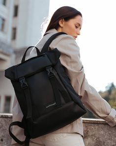 "HIGHLIGHTS: ✔️ Durable fabric ✔️ Padded straps and back for comfort ✔️ Compartment for a laptop up to 15\" ✔️ 1 front pocket ✔️ 1 side pocket Black roll top backpack for women: ✔️ Handmade ✔️ 100% vegan ✔️ Eco-leather, only organic materials ✔️ Unique design ✔️ Add personalization if you want More backpacks for urban city tour https://etsy.me/2JHH72X Need something that will let your hands stay free? Here https://etsy.me/2JGaXEW MEASUREMENTS: ✔️ Height: 37 cm / 14\"6 ✔️ Width: 30 cm / 11\"8 ✔️ Backpack Minimalist, Luggage Black, Roll Top Backpack, Basic Necessities, Black Rucksack, Canvas Rucksack, Vegan Leather Backpack, Men Backpack, Street Style Bags