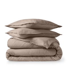 four pillows stacked on top of each other