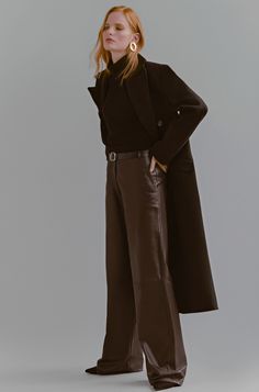 Women's Leather Pant In Chocolate Brown Women’s leather pants in chocolate brown bring effortless sophistication to any look. Crafted from genuine sheepskin leather with a semi-aniline finish, they offer a luxurious feel and durable wear. The wide-leg design adds a modern, relaxed vibe, while the classic jeans style features two front and two back pockets for functionality. The rich chocolate brown hue makes these pants a versatile choice, perfect for elevating both casual and dressy outfits. Ou Chocolate Brown Leather Pants, Women's Leather Pants, Leather Shorts Women, Short Leather Skirts, Brown Leather Pants, Old Money Outfits, Leather Jumpsuit, Refined Aesthetic, Shearling Vest