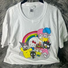 Brand New With Tags Smoke And Pet Free Home Sanrio Shirt With All The Characters: Kuromi, My Melody, My Little Twin Stars, Hello Kitty, Badzmaru, Pompompurin, Keroppi, Hamburger I Have Multiple Sizes Available! Please Check Out My Other Listings To Save On Shipping! Feel Free To Ask Questions And Make Reasonable Offers Through The “Make An Offer Button” Kawaii Hello Kitty Print Crew Neck Top, Playful Hello Kitty T-shirt For Summer, Multicolor Kawaii T-shirt For Spring, White Kawaii Tops With Graphic Print, White Kawaii Top With Graphic Print, Fun White Top With Cartoon Print, White Fun Tops With Cartoon Print, Fun White Tops With Cartoon Print, White Top With Cartoon Print