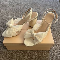 Loeffler Randall Camellia Heels In A Size 9.5 M. Ivory Pleated Uppers With Adorable Bows. Brand New In Box, Never Worn. Authentic! Originally $395. Chic Wedding Shoes With 4-inch Heel, Spring Wedding Shoes With Padded Block Heel, Chic Summer Wedding Heels, Chic Cream Block Heels With Sculpted Heel, Chic Cream Heels With Sculpted Heel, Chic Sandals With Stacked Heel For Wedding, Elegant Cream Block Heels With 4-inch Heel, Chic Block Heels For Spring Evening, Chic White Block Heels For Summer