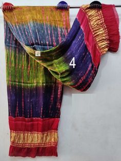 FREE Petticoat with every Saree and Legging with every Dupatta Order Pure Modal Silk Dupattas, With Tissue Pallu, Organic Multi Colors, Banjara Style, Natural Dyed, Dupatta for Women Shipping through DHL, FedEx, UPS, Indian Speed post, USPS Measurements: Length: 100 Inch Width: 44 Inch Fabric : Modal Silk with Tissue Pallu Feel: Soft Color: 100% Organic/Vegetable NOTE: As it is purely handmade, design may slightly vary while deliver.  FEATURES  - Handcrafted - Hand block - Hand printed - Handmad Luxury Multicolor Silk Thread Dupatta, Luxury Multicolor Batik Print Dupatta, Luxury Multicolor Silk Dupatta, Luxury Multicolor Unstitched Dupatta, Luxury Multicolor Dupatta For Rituals, Cheap Dupatta With Pallu For Puja, Traditional Festival Dupatta At Affordable Price, Luxury Multicolor Dupatta With Woven Motifs, Luxury Multicolor Dupatta With Weaving Work