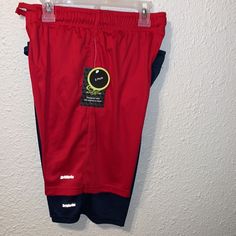 Driworks Athletic Shorts For Boys. For Your Little Athlete. Score A Two-Pack Of Performance Boys Shorts From Athletic Works Featuring A Comfortable Elastic Waist With Drawcord. Side Pockets Help Keep His Essentials Close While Moisture Wicking Technology Helps Keep Him Comfortable And Dry All Day Long, On And Off The Field. 1st Pair Red And 2nd Pair Blue And Shorts Size - L 10-12 Sporty School Bottoms With Built-in Shorts, Sporty Short Bottoms For School, Sporty Short School Bottoms, Red Activewear Shorts For Sports, Red Activewear For Sports Events, Sporty School Shorts With Elastic Waistband, Sporty School Shorts, Team-colored Athletic Shorts For Gym, Team-colored Short Activewear