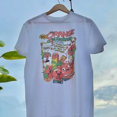 Orange Concentrate Tee / Kawaii Clothes / Cute Kawaii - Etsy Philippines Fun Cartoon Print Tops For Streetwear, Kidcore Clothing, Shirts Kawaii, Cute Kawaii Aesthetic, Kawaii Shirt, Harajuku Clothes, Clothes Kawaii, Retro Cottagecore, Kawaii Shirts