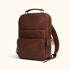 We aimed for the spirit of Roosevelt, of action and purpose, into our new commuter backpack. Crafted from the untamed strength and character of rich full grains of buffalo leather which epitomizes durability and rugged luxurious style. Within its soft but sturdy construction, this backpack unveils a multitude of compartments meticulously designed to accommodate your every need. From safeguarding your laptop (up to 15") with a cushioned section, to providing a secure space for your iPad, notebook Buffalo Brand Dress, Textured Leather Backpack For On-the-go, Textured Leather Travel Backpack, Everyday Textured Leather Standard Backpack, Everyday Textured Leather Backpack, Textured Leather Backpack For Everyday Use, On-the-go Smooth Grain Leather Backpack, Classic Textured Leather Backpack For On-the-go, Luxury Leather Backpack With Textured Leather For Daily Use