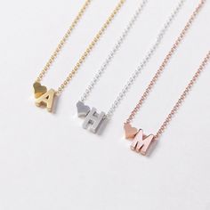 Dainty ♥ initial necklace - a meaningful piece of jewelry that is simple and stylish. D E T A I L S * Single initial size is approximately 5 x 7 mm * Chain is 14k gold fill, sterling silver, or 14k rose gold fill OR 14k gold plate, silver plate, or 14k rose gold plate * Charms are matte gold plate, matte silver plate, or shiny rose gold plate * This listing is for one necklace with two charms P R O M O T I O N * Bridesmaids gifts: message us for a coupon code * New FACEBOOK or INSTAGRAM follower Initial Pendant Charm Necklaces For Valentine's Wedding, Initial Pendant Charm Necklaces For Wedding On Valentine's Day, Valentine's Day Wedding Charm Necklace With Initial Pendant, Initial Necklace For Bridesmaid Gift On Mother's Day, Silver Heart Pendant Initial Necklace For Mother's Day, Silver Heart Necklace With Initial Pendant, Silver Heart Initial Pendant Necklace, Silver Heart Initial Necklace For Mother's Day, Mother's Day Initial Pendant Heart Necklace With Initials