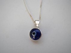 Cobalt Blue Evil Eye Charm Necklace Sterling Silver Blue Sterling Silver Charm Necklaces For Gifts, Blue Sterling Silver Charm Necklace, Nickel Free, Blue Sterling Silver Charm Necklace Nickel Free, Nickel-free Blue Round Pendant Necklace, Blue Nickel-free Round Pendant Necklace, Handmade Blue Sterling Silver Charm Necklace, Blue Sterling Silver Charm Necklaces, Blue Sterling Silver Charm Necklace, Blue Sterling Silver Charm Necklace With Lobster Clasp