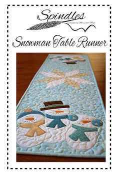 a table runner with snowmen on it and the words sewnn table runner