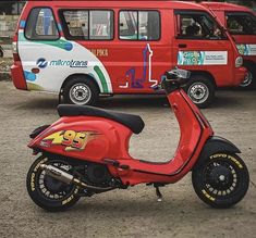 a red motor scooter parked in front of a van with the number 99 on it