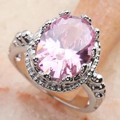 Luxury Pink Topaz Ring For Formal Occasions, Elegant Pink Topaz Ring For Formal Occasions, Formal Pink Crystal Ring With Halo Setting, Luxury Pink Topaz Round Ring, Luxury Pink Oval Topaz Ring, Pink Crystal Ring For Formal Occasions, Pink Crystal Ring For Formal Events, Fine Jewelry, Pink Crystal Ring For Formal Events, Elegant Pink Topaz Ring For Anniversary